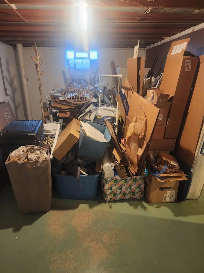 Roll-off dumpster container at job site for 15 Yard Dumpster Rental in Austell